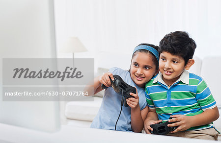 Children playing video game