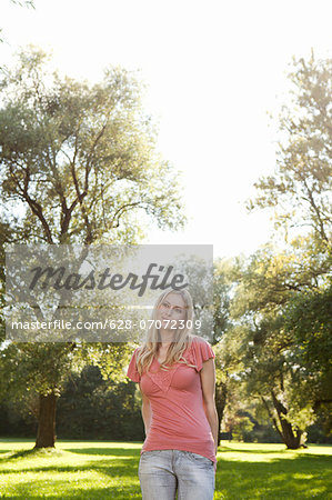 Smiling young woman outdoors