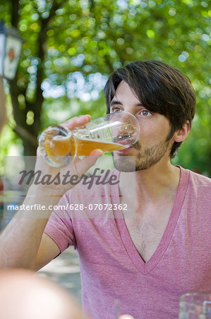 Man drinking beer in beer garden