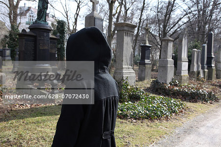 Mourner on a cemetery, Munich, Bavaria, Germany