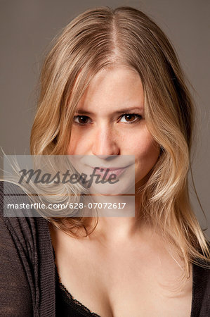 Young blond woman with brown eyes