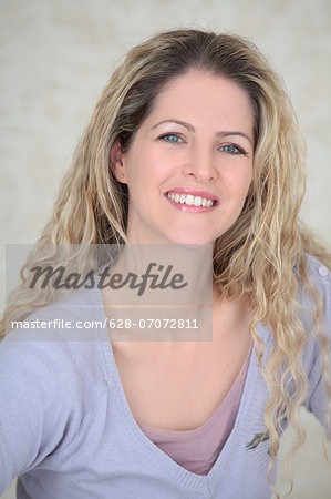 Smiling blond woman, portrait