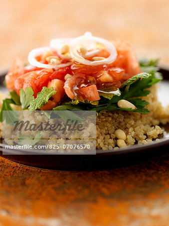 Quinoa taboulleh with tomatoes,pine nuts and onions