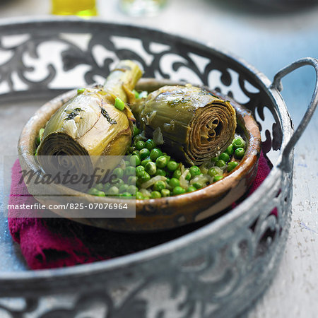 Purple artichoke and pea Tajine