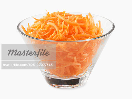 Bowl of grated carrots Bowl of grated carrots