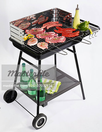 Assorted pieces of meat on the barbecue