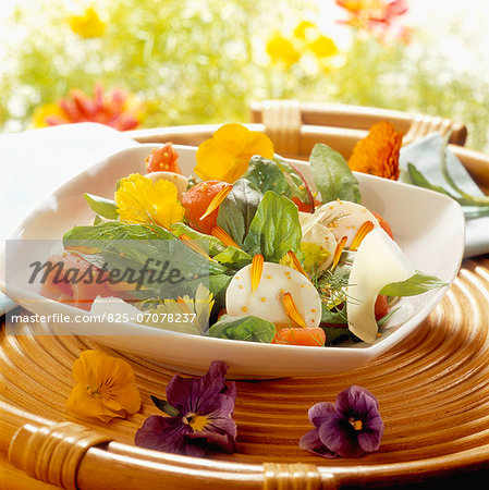 Spinach,tomato and edible flower salad