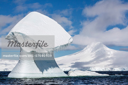 Huge mushroom shaped iceberg in Dorian Bay, western side of the Antarctic Peninsula, Southern Ocean, Polar Regions