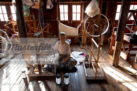 Woman spinning silk in factory in In Phaw Khone village, Inle Lake, Myanmar (Burma), Southeast Asia