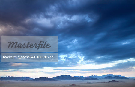 View at dusk over the magnificent landscape of the Namib Rand game reserve, Namib Naukluft Park, Namibia, Africa