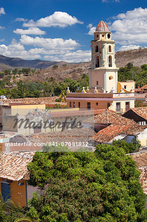 View over pantiled rooftops of the town towards the belltower of The Convento de San Francisco de Asis, Trinidad, UNESCO World Heritage Site, Cuba, West Indies, Central America