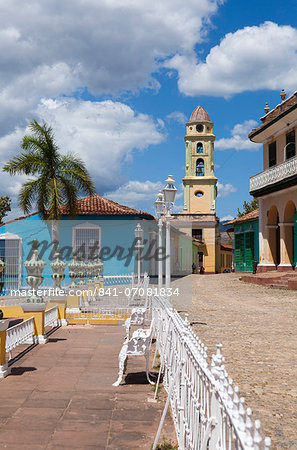 View across Plaza Mayor towards Museo Romantico and the belltower of The Convento de San Francisco de Asis, Trinidad, UNESCO World Heritage Site, Cuba, West Indies, Central America