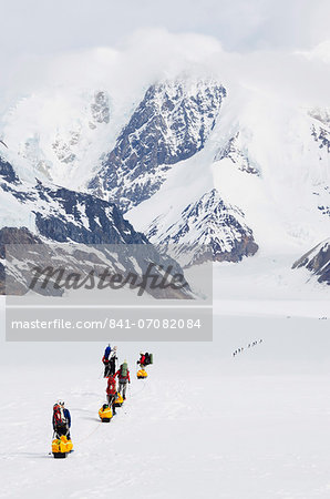 Climbing expedition leaving base camp on Mount McKinley, 6194m, Denali National Park, Alaska, United States of America, North America