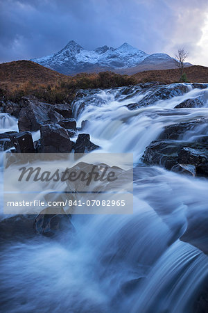 Waterfall on the River Sligachan in winter, with Sgurr nan Gillean mountain in the background, Isle of Skye, Inner Hebrides, Scotland, United Kingdom, Europe