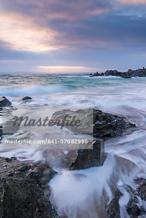 Winter sunrise at Porthgwidden Beach in St. Ives, Cornwall, England, United Kingdom, Europe