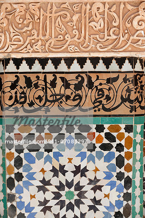 Detail of calligraphy and zellij in the patio, Ben Youssef Meders, the largest Medersa in Morocco, originally a religious school founded under Abou el Hassan, UNESCO World Heritage Site, Marrakech, Morocco, North Africa