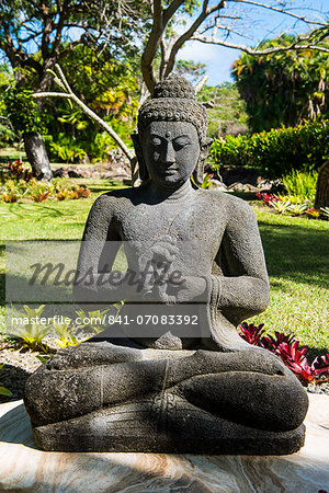 Buddhist statues in the Botanical gardens in Nevis island, St. Kitts and Nevis, Caribbean