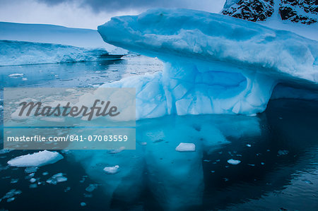 Huge glaciers shining blue, Danco Island, Antarctica, Polar Regions