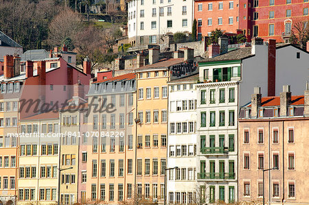 Typical colourful building facades facing onto the River Saone in Lyon, Rhone-Alpes, France, Europe