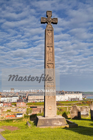 A Celtic style cross in the church yard at Whitby in the North York Moors, Yorkshire, England, United Kingdom, Europe