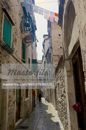 Back street with traditional stone buildings in Split, Croatia, Europe