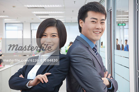 Two Business People with Arms Crossed