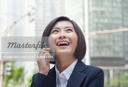 Young Businesswoman with Cell Phone