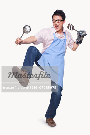 Young Man Playing with Cooking