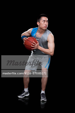 Basketball player, black background