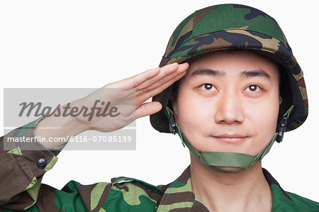 Man in military uniform saluting