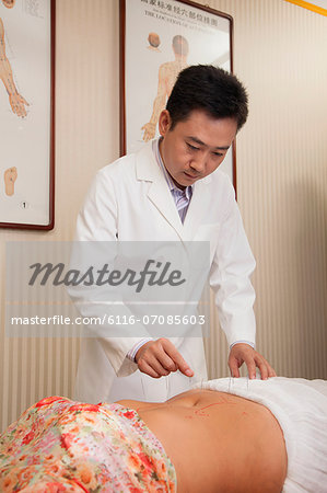 Inserting Acupuncture Needles