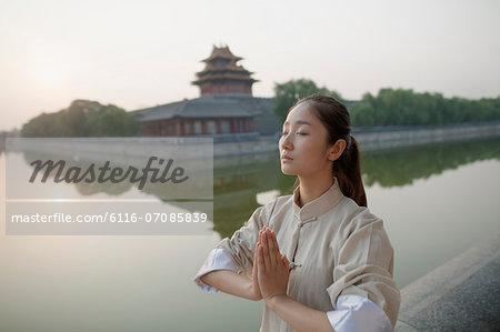 Young Woman Practicing Tai Ji