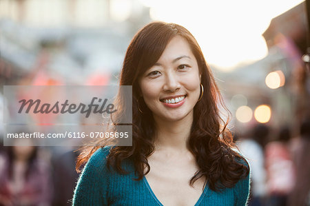 Portrait Of Smiling Mid Adult Woman In Houhai, Beijing