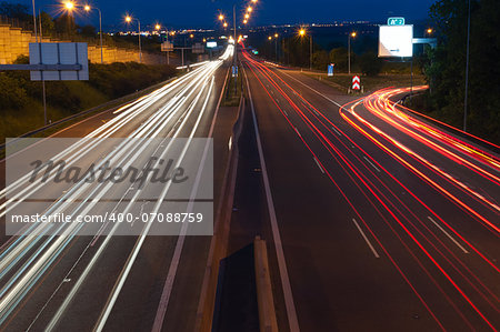 Traffic Lights - Cars in Motion on Night Highway