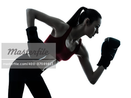 one caucasian woman boxing exercising in silhouette studio  isolated on white background