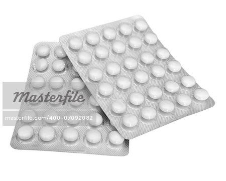 White pills in blister packs isolated on white - with clipping path