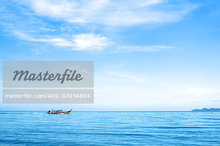 seascape with boat and rocks, Andaman Sea, Thailand