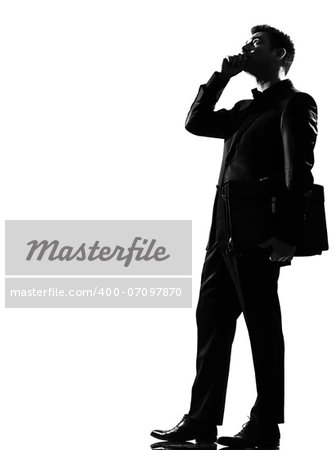 silhouette caucasian business man on the phone expressing behavior full length on studio isolated white background