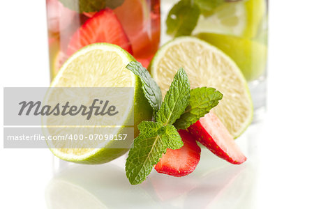 Lime, strawberry and mint isolated on white background