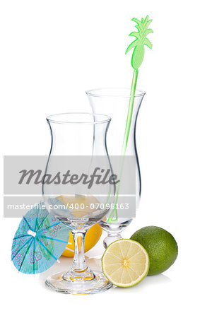 Cocktail glasses and citruses. Isolated on white background