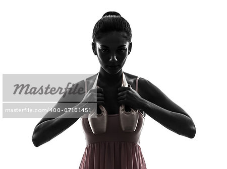 one woman ballerina ballet dancer dancing holding shoes in silhouette on white background
