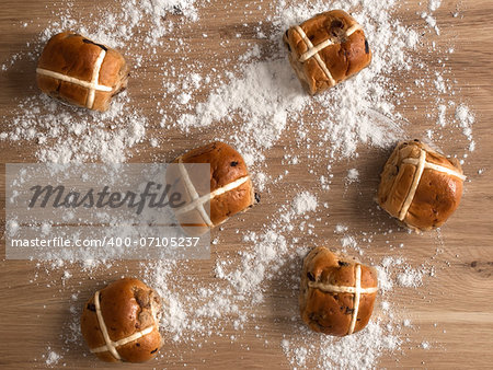 close up of freshly baked hot cross buns