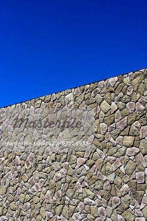 Stone wall and blue sky