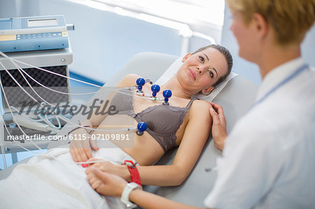 Female patient receiving electrocardiogram, Germany