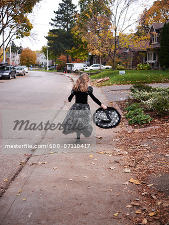 Girl Trick or Treating in Witch Costume, Toronto, Ontario, Canada