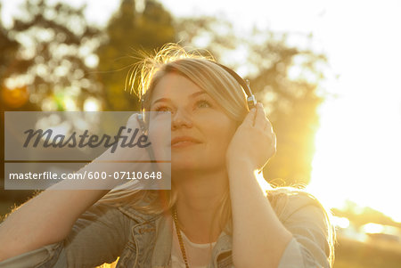 Young Woman Listening to Music with Headphones, Mannehim, Baden-Wurttemberg, Germany