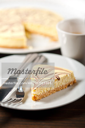 fresh baked classic Cheese cake with chocolate topping and espresso coffee