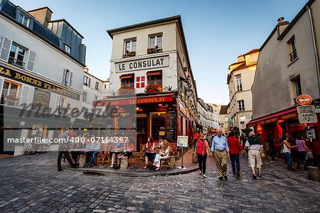 PARIS - July 1: View of typical paris cafe on July 1, 2013 in Paris. Montmartre area is among most popular destinations in Paris, Le Consulat is a typical cafe.