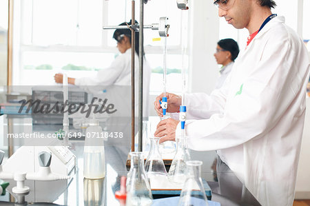 Chemistry students doing experiment