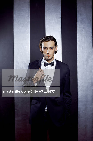 Portrait of young man wearing bow tie Portrait of young man wearing bow tie